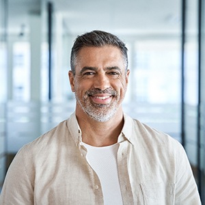 Closeup of man smiling in office